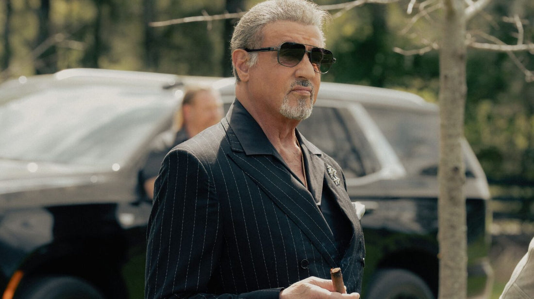 Sylvester Stallone as Dwight Manfredi wearing a tailored suit